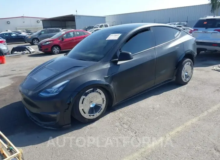 TESLA MODEL Y 2023 vin 7SAYGAEE5PF588355 from auto auction Iaai