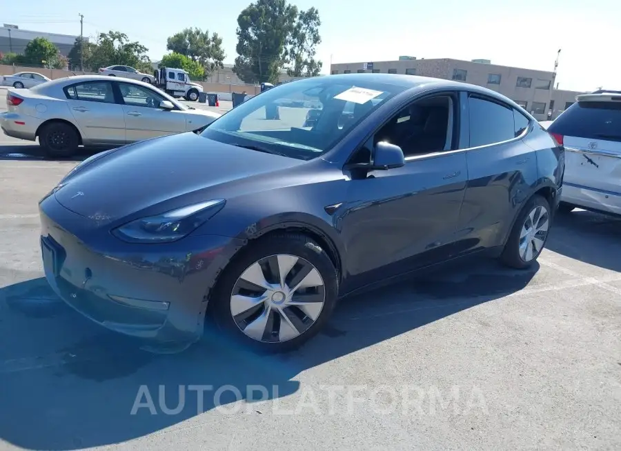 TESLA MODEL Y 2023 vin 7SAYGDEE3PF964181 from auto auction Iaai