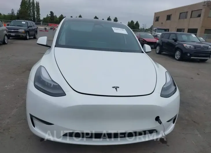 TESLA MODEL Y 2023 vin 7SAYGDEE4PF751899 from auto auction Iaai