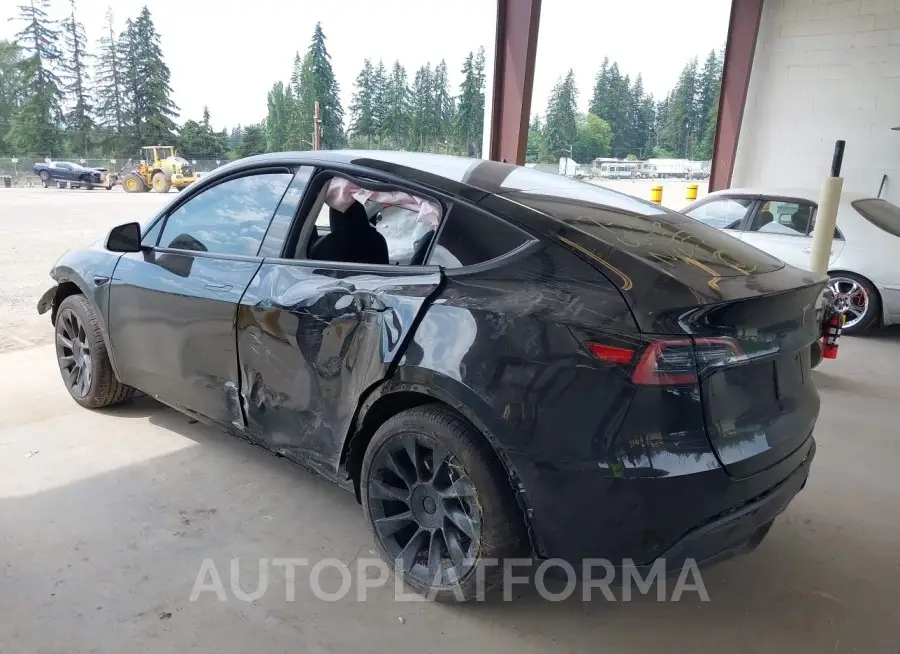 TESLA MODEL Y 2023 vin 7SAYGDEE9PF880205 from auto auction Iaai