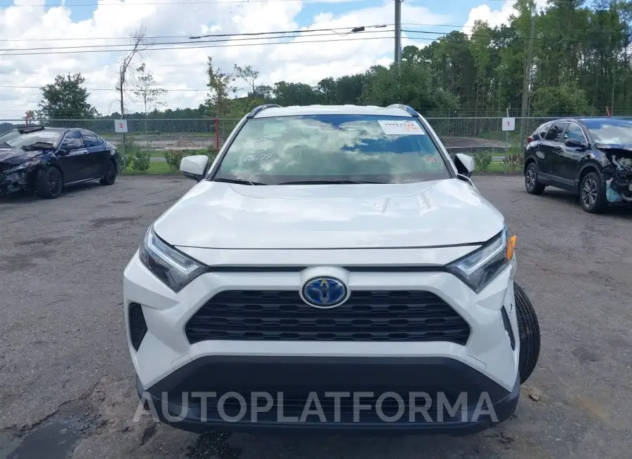 TOYOTA RAV4 HYBRID 2023 vin JTMRWRFV6PD206679 from auto auction Iaai