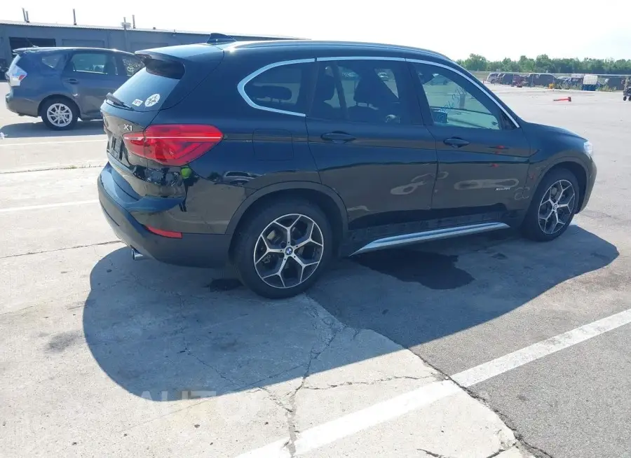 BMW X1 2018 vin WBXHT3C31J5K20837 from auto auction Iaai