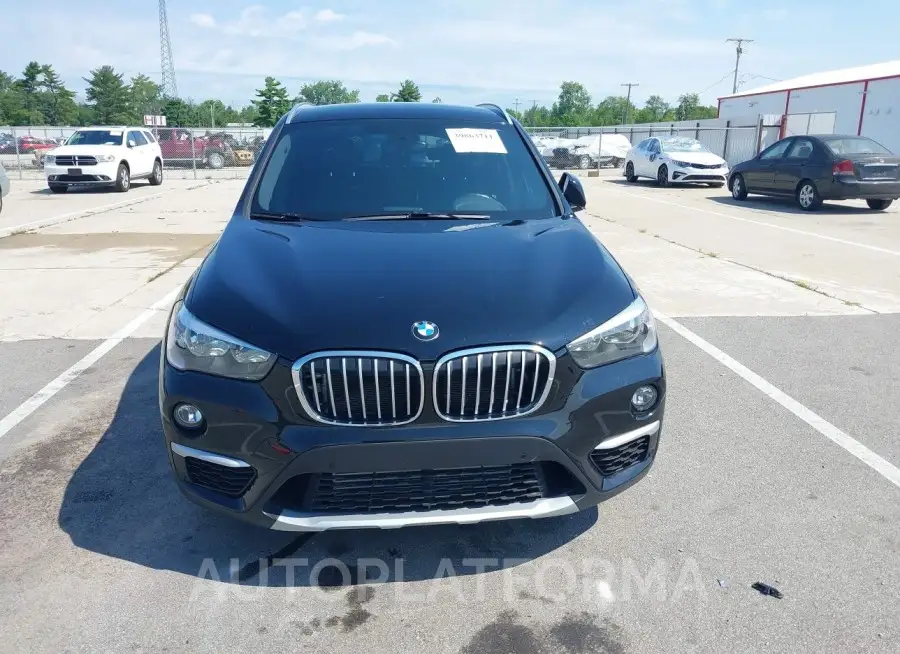 BMW X1 2018 vin WBXHT3C31J5K20837 from auto auction Iaai