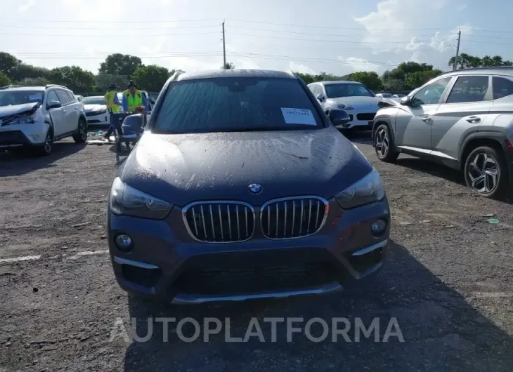 BMW X1 2019 vin WBXHU7C5XK5L12312 from auto auction Iaai