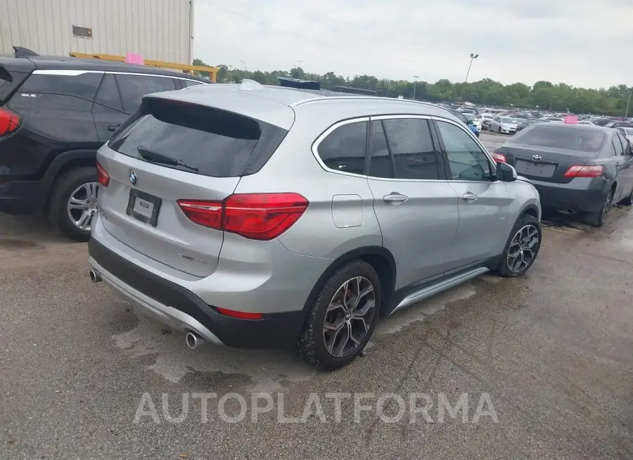 BMW X1 2021 vin WBXJG9C02M5S55115 from auto auction Iaai