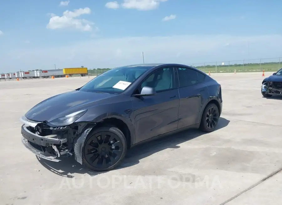 TESLA MODEL Y 2023 vin 7SAYGAEE8PF662383 from auto auction Iaai