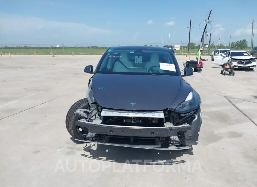 TESLA MODEL Y 2023 vin 7SAYGAEE8PF662383 from auto auction Iaai