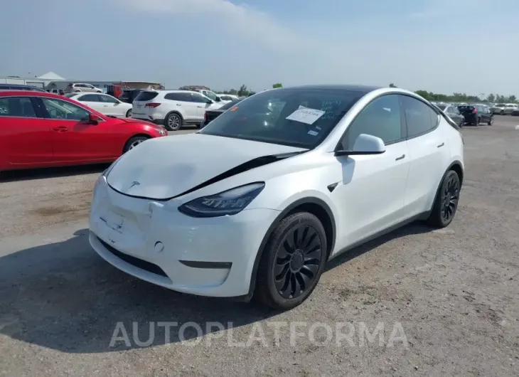 TESLA MODEL Y 2023 vin 7SAYGDEEXPA059529 from auto auction Iaai