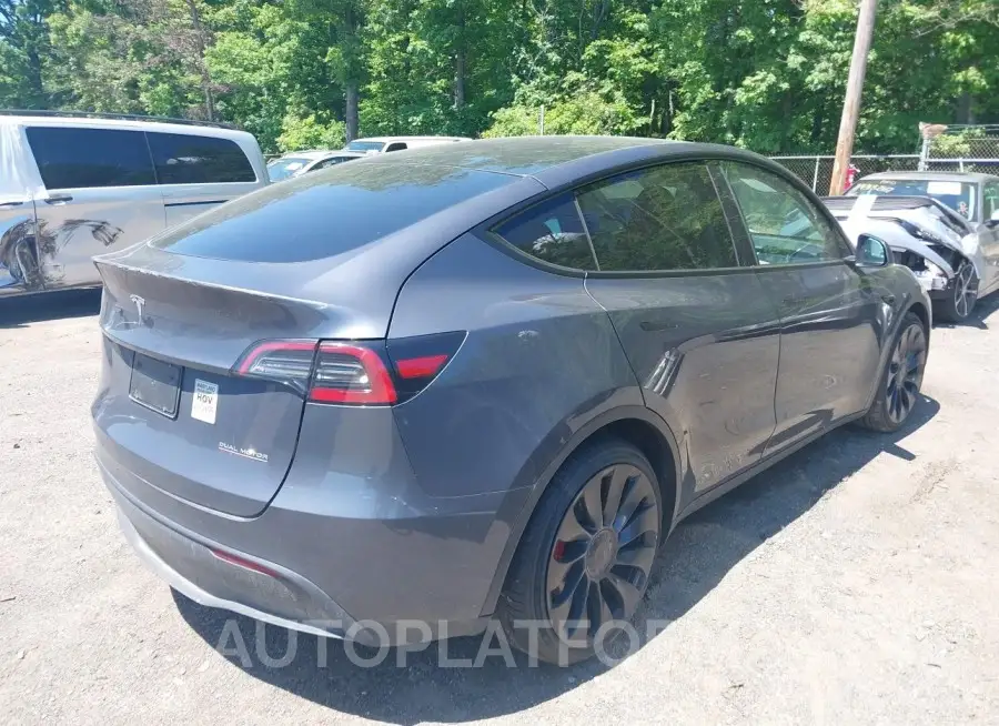 TESLA MODEL Y 2023 vin 7SAYGDEF7PF801042 from auto auction Iaai