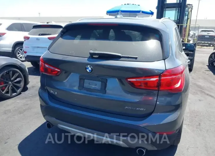 BMW X1 2019 vin WBXHT3C51K3H34530 from auto auction Iaai