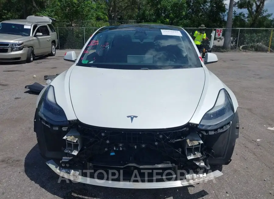 TESLA MODEL 3 2021 vin 5YJ3E1EA6MF020847 from auto auction Iaai