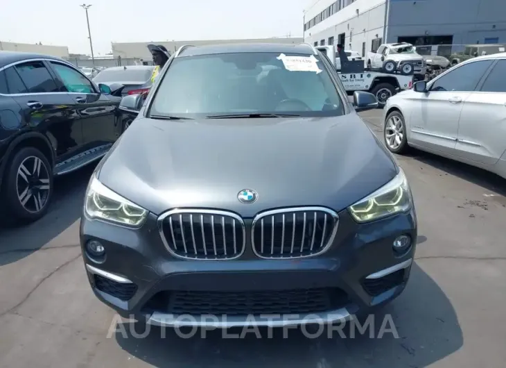 BMW X1 2017 vin WBXHT3C39H5F73131 from auto auction Iaai