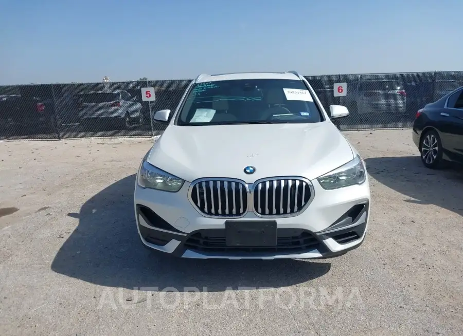 BMW X1 2021 vin WBXJG7C04M5T76880 from auto auction Iaai