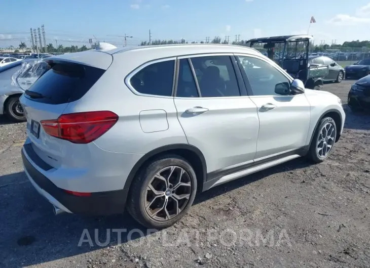 BMW X1 2021 vin WBXJG7C00M5T75533 from auto auction Iaai