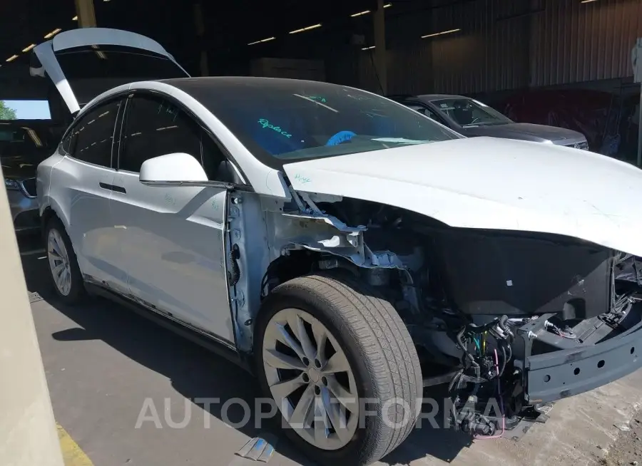 TESLA MODEL X 2020 vin 5YJXCDE21LF304273 from auto auction Iaai