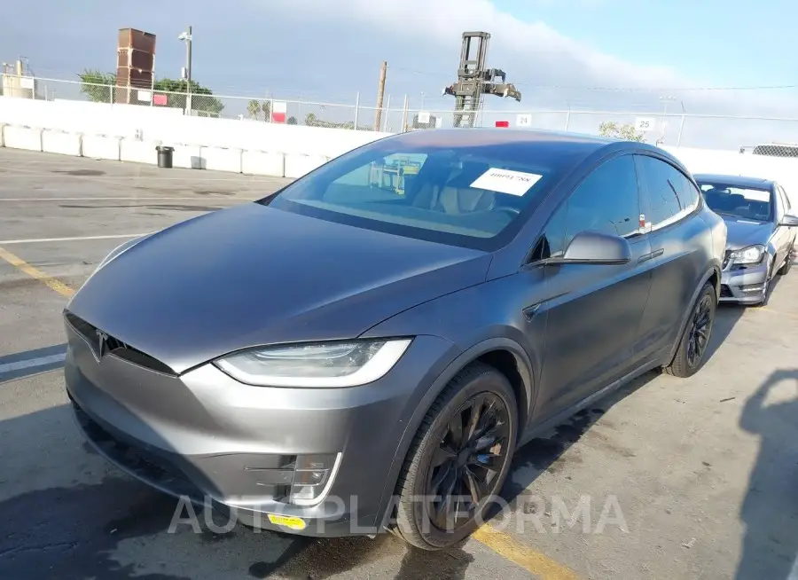 TESLA MODEL X 2021 vin 5YJXCBE22MF323243 from auto auction Iaai