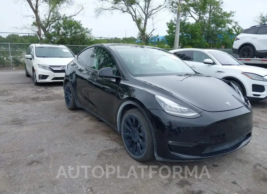 TESLA MODEL Y 2021 vin 5YJYGAEE9MF112117 from auto auction Iaai