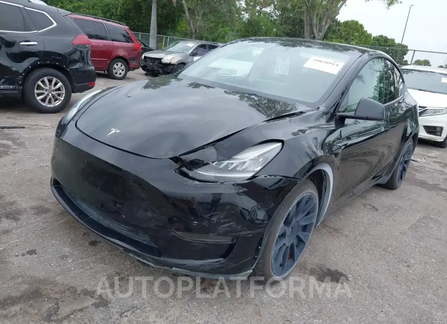 TESLA MODEL Y 2021 vin 5YJYGAEE9MF112117 from auto auction Iaai