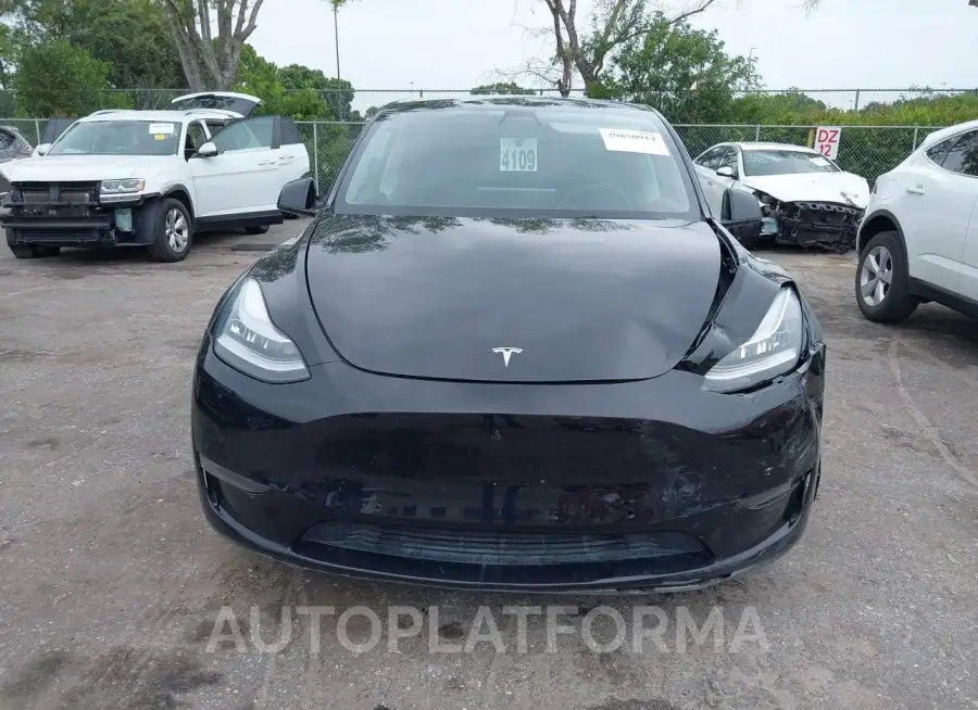 TESLA MODEL Y 2021 vin 5YJYGAEE9MF112117 from auto auction Iaai