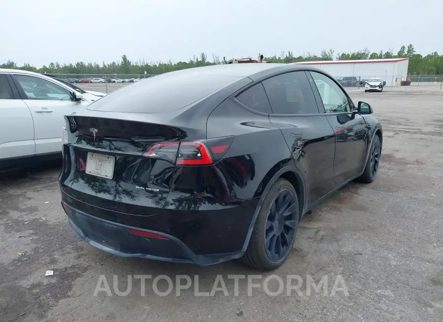 TESLA MODEL Y 2021 vin 5YJYGAEE9MF112117 from auto auction Iaai