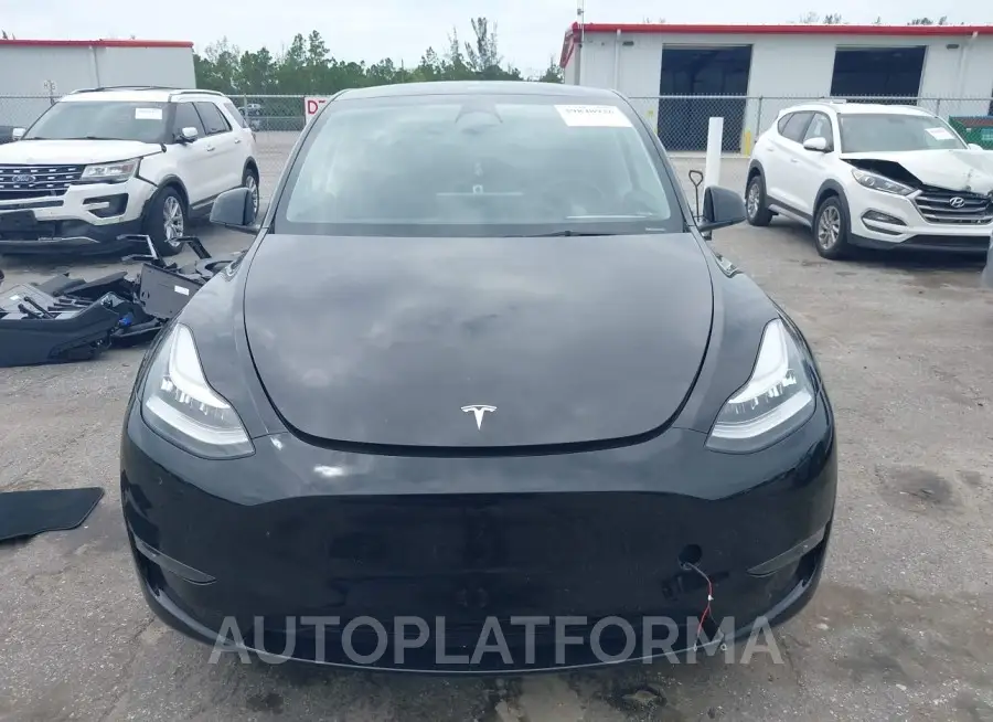 TESLA MODEL Y 2023 vin 7SAYGDEE5PA107728 from auto auction Iaai