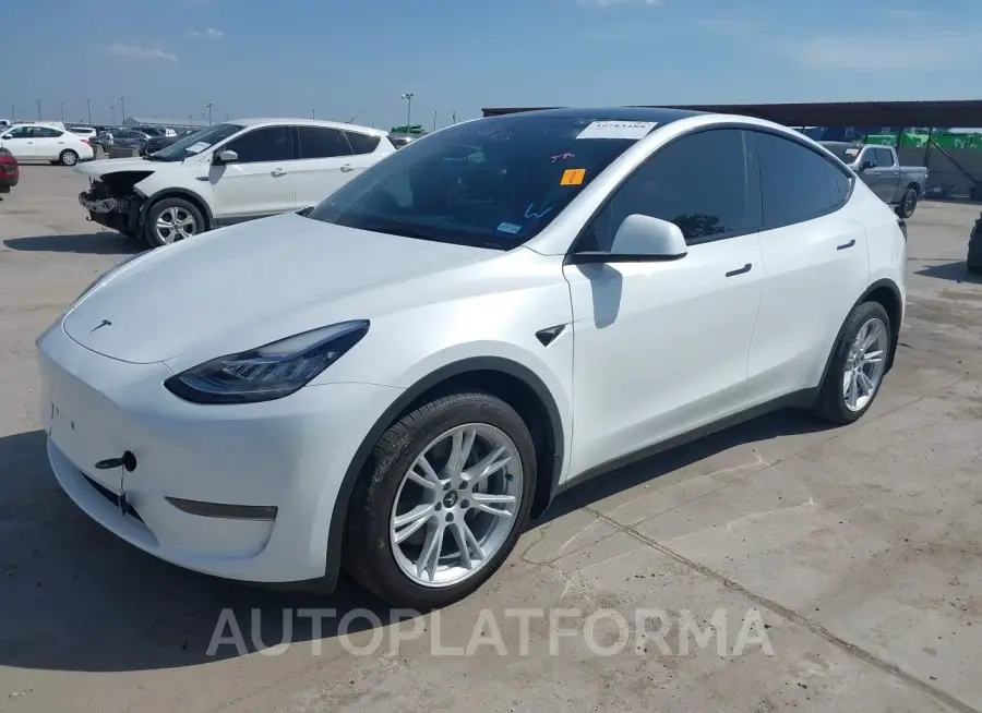 TESLA MODEL Y 2023 vin 7SAYGDEE5PA147002 from auto auction Iaai