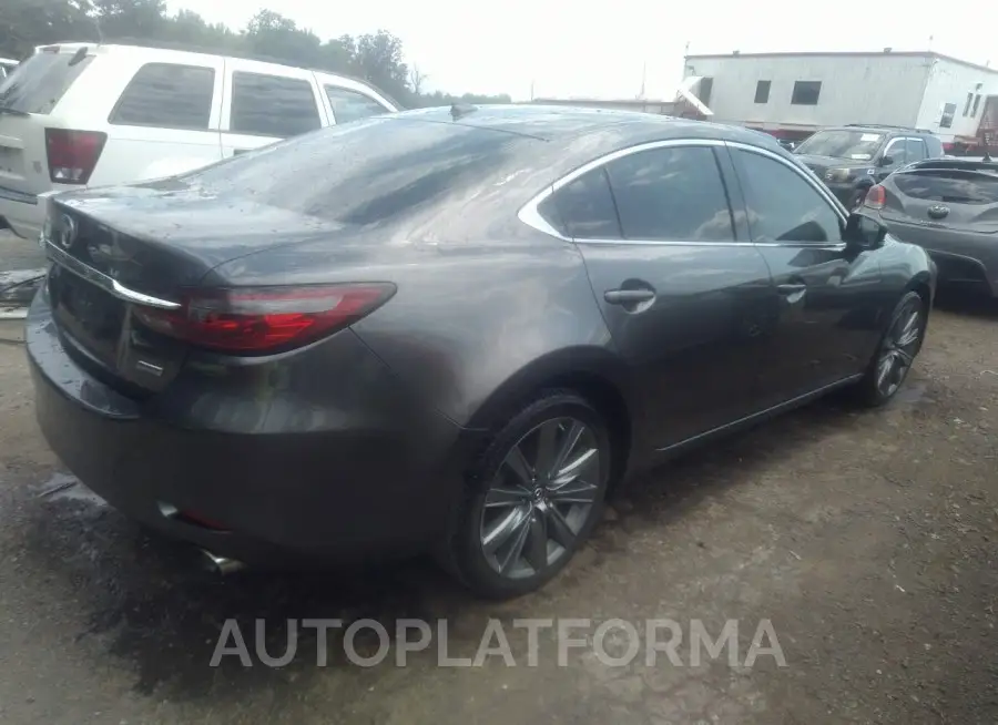 MAZDA MAZDA6 2018 vin JM1GL1TY7J1335801 from auto auction Iaai