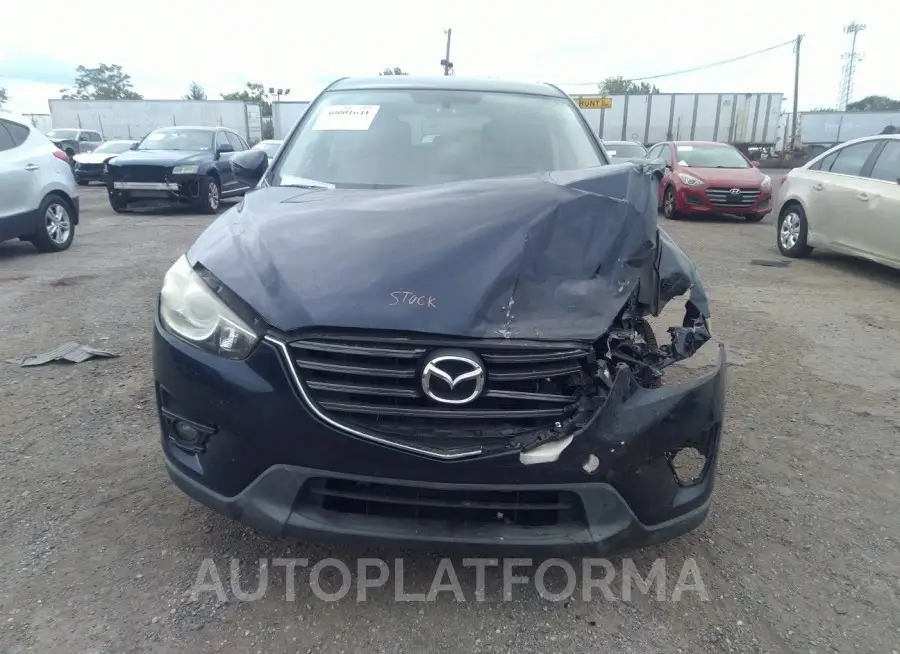 MAZDA CX-5 2016 vin JM3KE4CY2G0764906 from auto auction Iaai