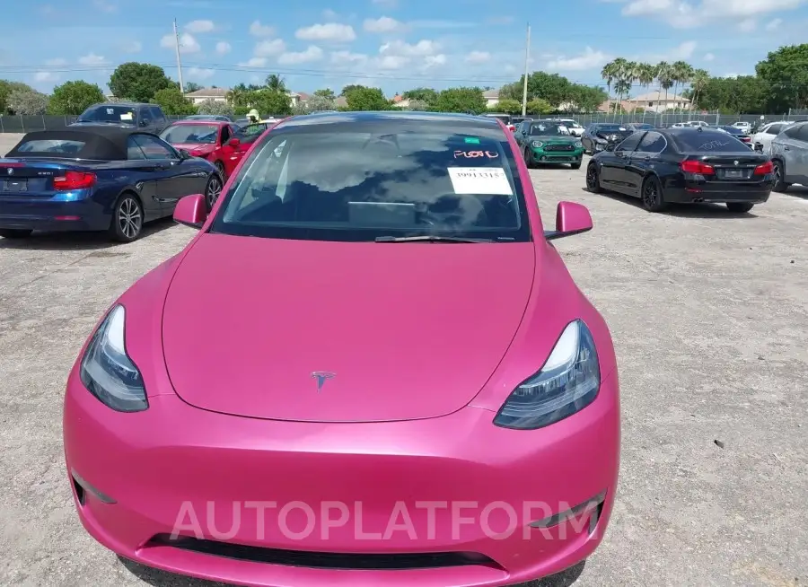 TESLA MODEL Y 2023 vin 7SAYGDEE2PA128861 from auto auction Iaai