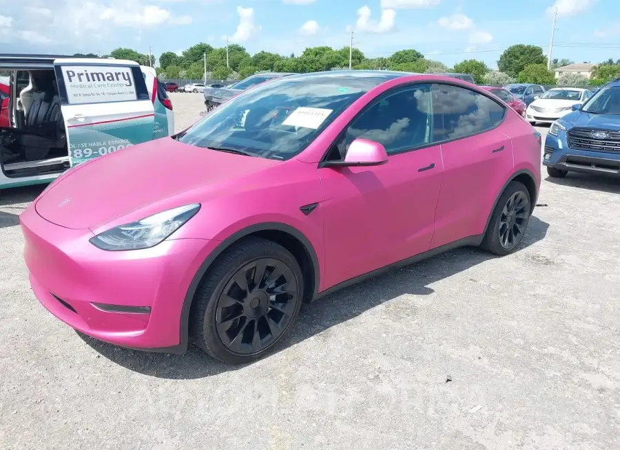 TESLA MODEL Y 2023 vin 7SAYGDEE2PA128861 from auto auction Iaai