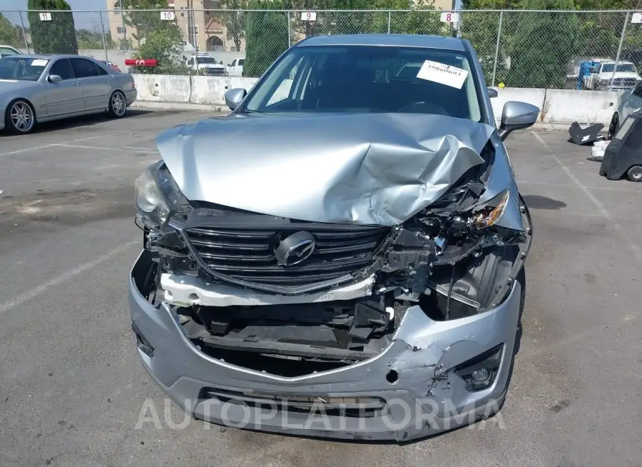 MAZDA CX-5 2016 vin JM3KE2CY3G0677939 from auto auction Iaai