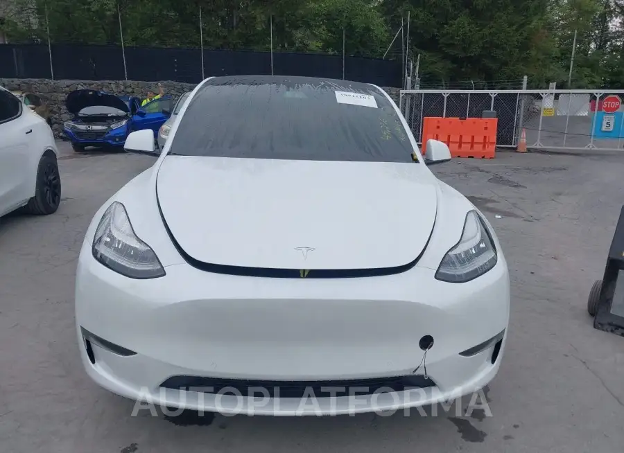 TESLA MODEL Y 2022 vin 7SAYGDEEXNF423996 from auto auction Iaai