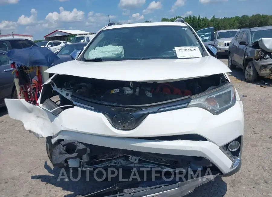 TOYOTA RAV4 HYBRID 2016 vin JTMRJREV4GD059147 from auto auction Iaai