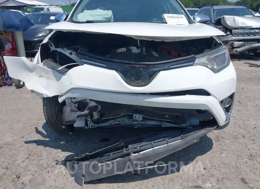 TOYOTA RAV4 HYBRID 2016 vin JTMRJREV4GD059147 from auto auction Iaai