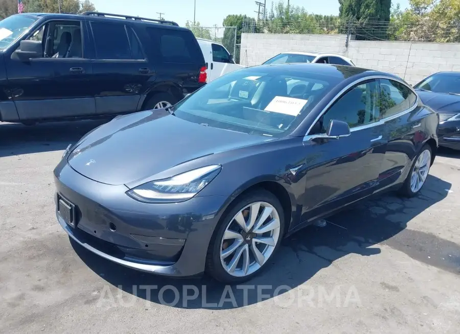 TESLA MODEL 3 2018 vin 5YJ3E1EB2JF090821 from auto auction Iaai