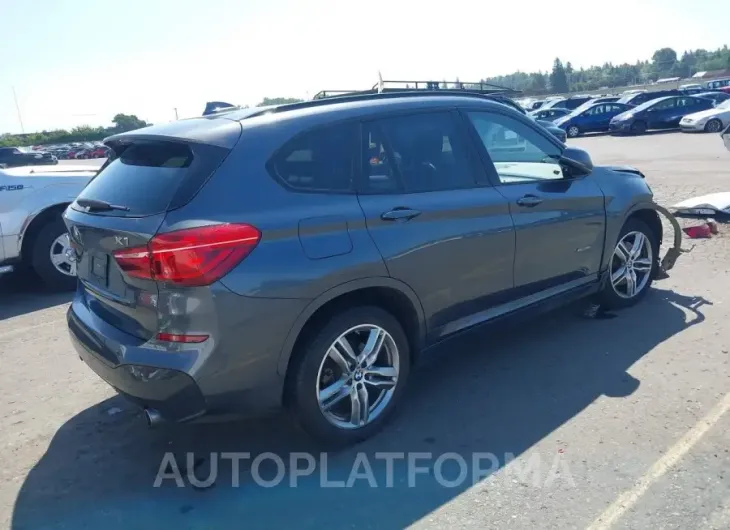 BMW X1 2018 vin WBXHT3C38J5F91674 from auto auction Iaai