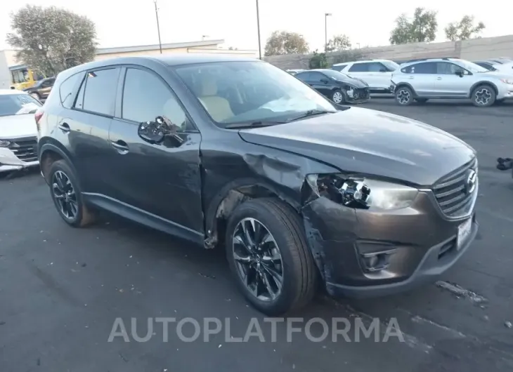 MAZDA CX-5 2016 vin JM3KE2DY4G0835977 from auto auction Iaai