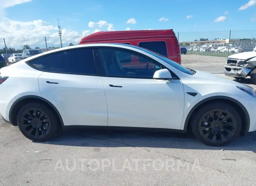 TESLA MODEL Y 2023 vin 7SAYGDEE2PA110084 from auto auction Iaai