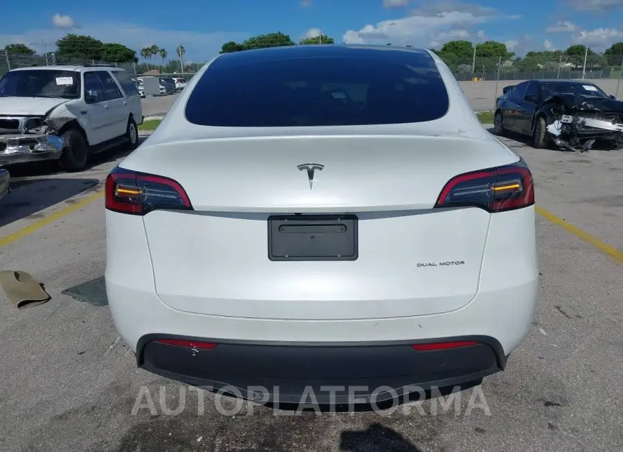 TESLA MODEL Y 2023 vin 7SAYGDEE2PA110084 from auto auction Iaai