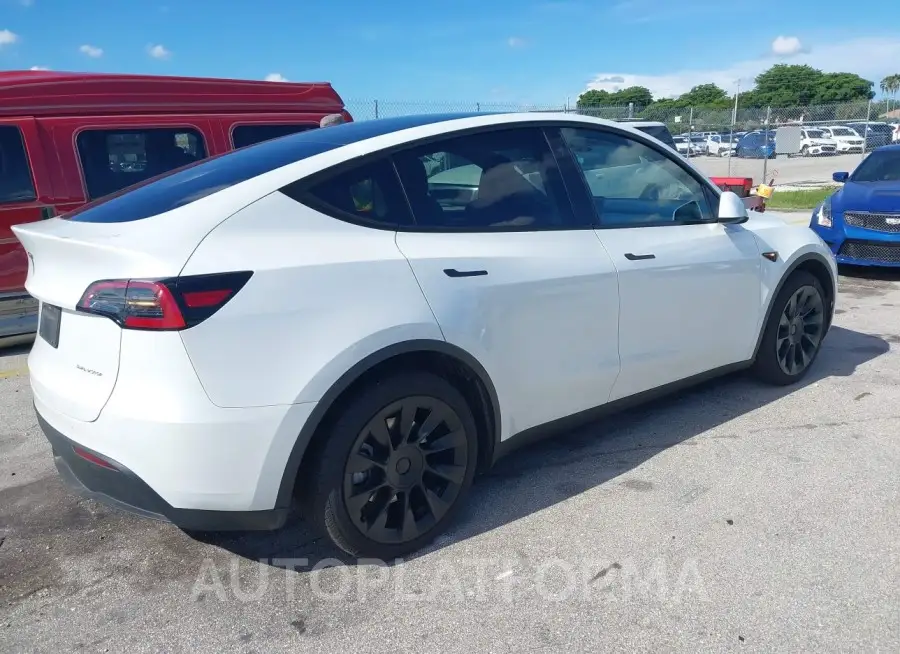 TESLA MODEL Y 2023 vin 7SAYGDEE2PA110084 from auto auction Iaai