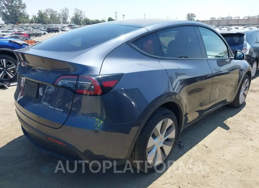 TESLA MODEL Y 2023 vin 7SAYGDEE8PA079956 from auto auction Iaai