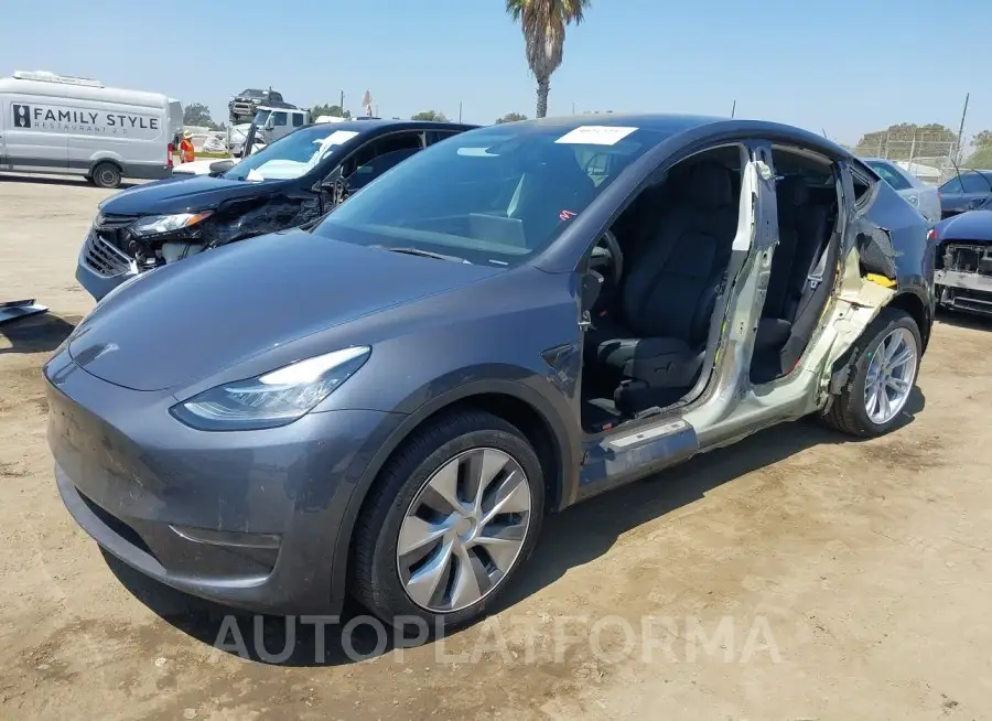 TESLA MODEL Y 2023 vin 7SAYGDEE8PA079956 from auto auction Iaai