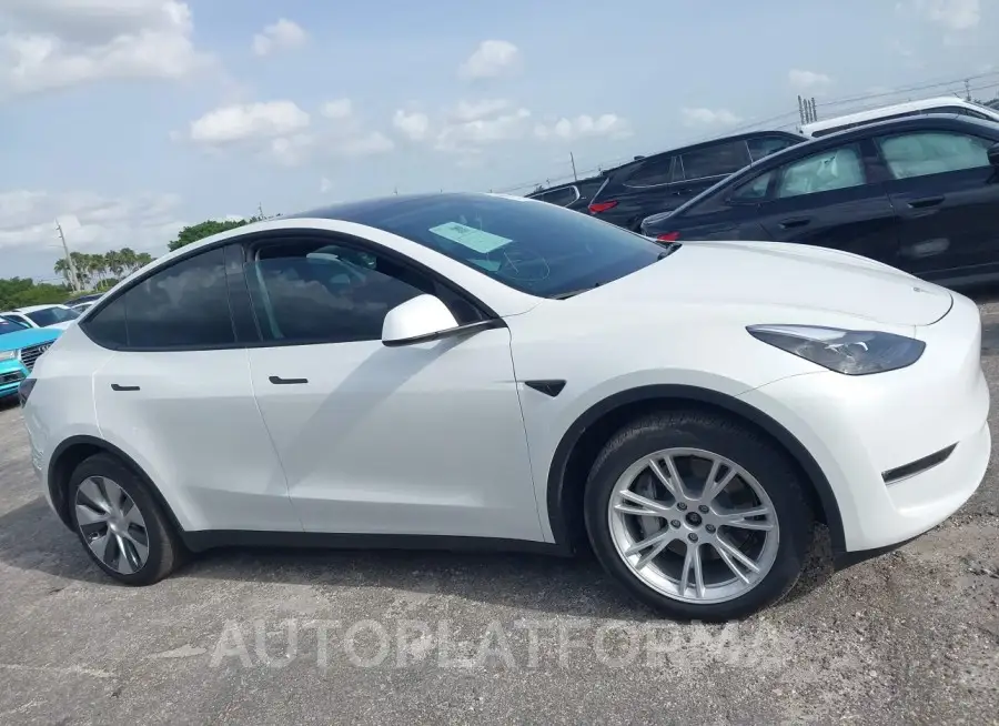 TESLA MODEL Y 2023 vin 7SAYGDEE9PF761733 from auto auction Iaai