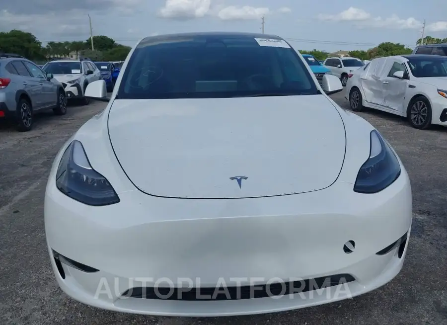 TESLA MODEL Y 2023 vin 7SAYGDEE9PF761733 from auto auction Iaai