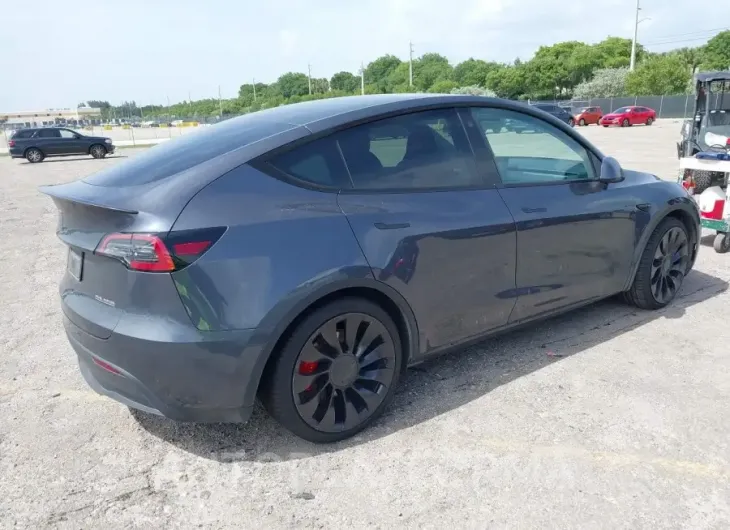 TESLA MODEL Y 2022 vin 7SAYGDEF7NF440747 from auto auction Iaai