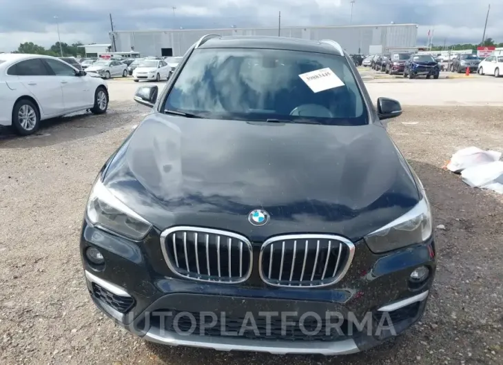 BMW X1 2018 vin WBXHT3C31J5K22684 from auto auction Iaai