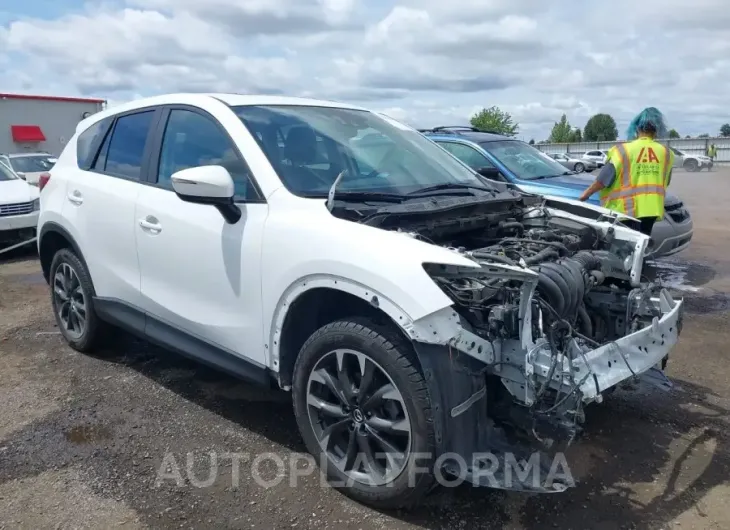 MAZDA CX-5 2016 vin JM3KE4DY3G0676252 from auto auction Iaai