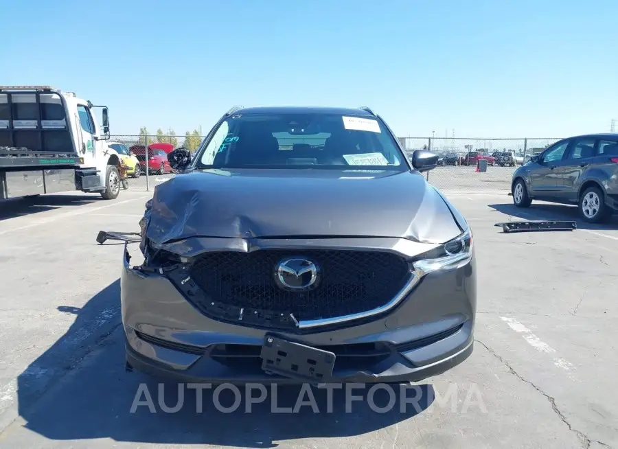 MAZDA CX-5 2019 vin JM3KFACM7K1502861 from auto auction Iaai