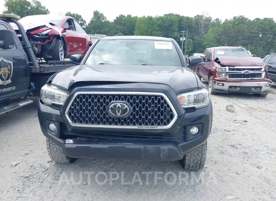 TOYOTA TACOMA 2018 vin 3TMCZ5ANXJM138055 from auto auction Iaai