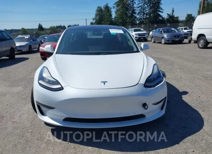 TESLA MODEL 3 2018 vin 5YJ3E1EA7JF014809 from auto auction Iaai